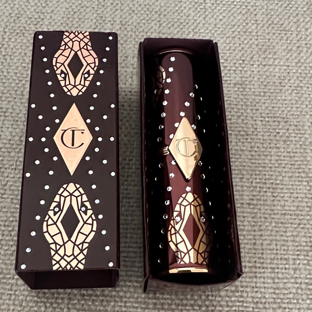 Charlotte Tilbury Deep Red Lipstick with Gold and Silver Accents